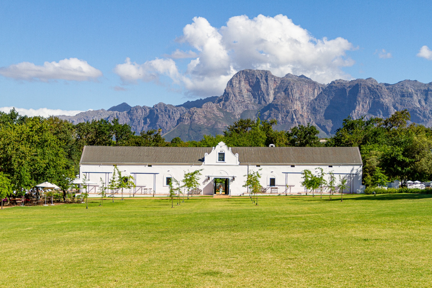 Historic Plaisir cellar with Simonsberg mountain backdrop