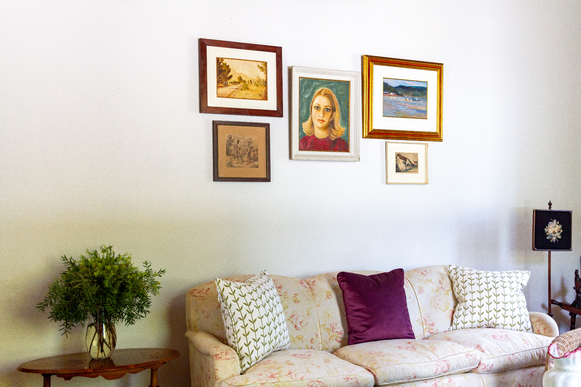 Lady Grey Suite lounge seating with framed artwork above the sofa