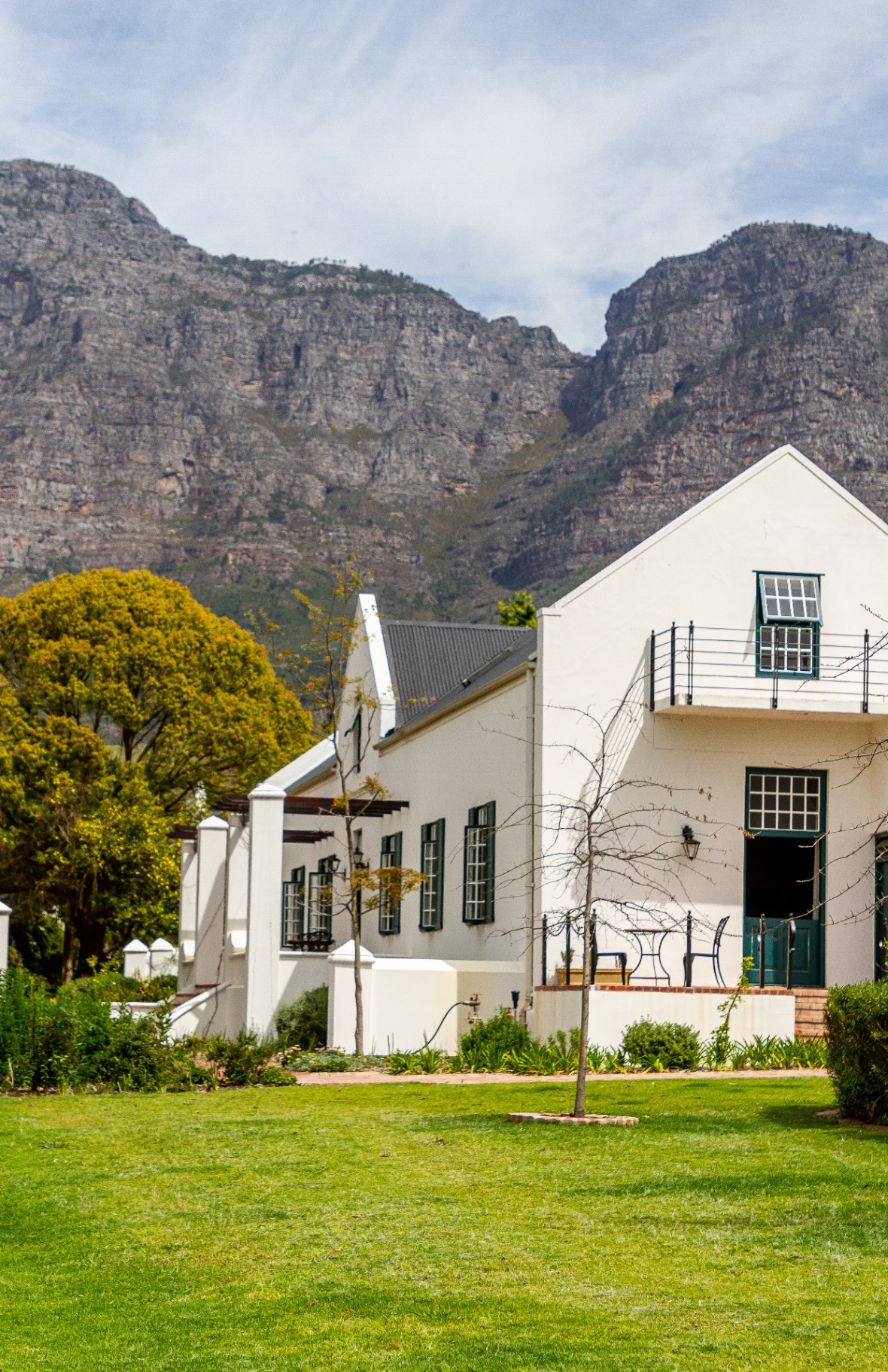 Manor Suite and Old Mill Suite exterior with Franschhoek mountain backdrop