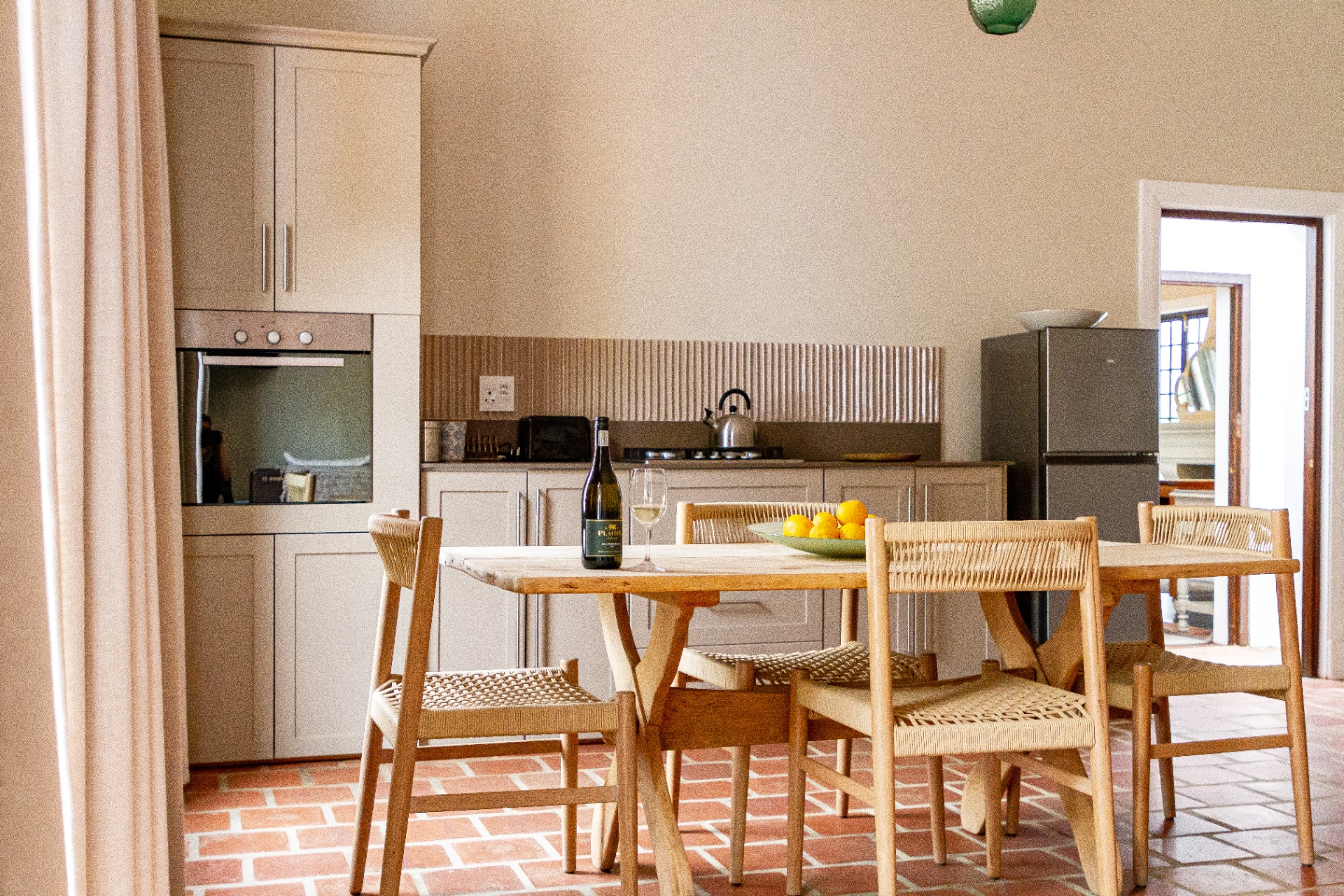 Merle Cottage self-catering kitchen with dining table